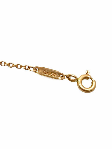 Bracelet Tiffany & Co T - Bracelet en or jaune 18K et diamants 58 Facettes 2134
