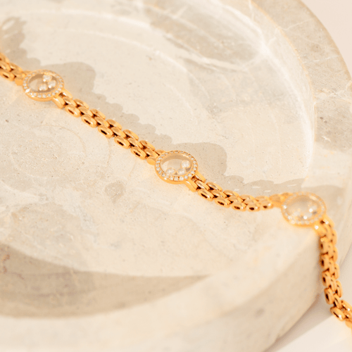 https://cdn.shopify.com/s/files/1/0442/6560/3235/files/chopard-happy-diamonds-armband-aus-18-karat-gelbgold-96-diamanten-12-lose-brillanten-dreireihiges-gliederarmband-18cmhoney-jewelry-7720569.png?v=1772565164