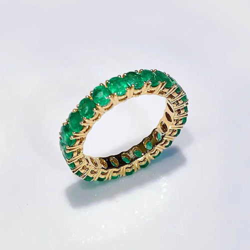 emerald-3ct-oval-emerald-eternity-ring-18k-gold-5.jpg