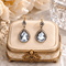 Boucles d'oreilles Boucles d'oreilles en or jaune, argent, aigue-marine et diamants 58 Facettes 50482