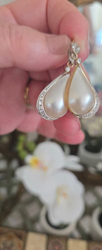 Boucles d'oreilles Boucles d'oreilles vintage en or blanc et jaune 18 ct, perles et diamants 58 Facettes 1