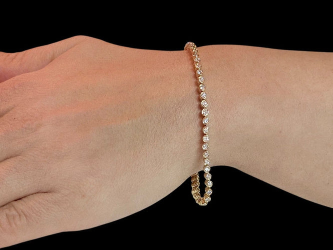 Bracelet Bracelet tennis en or jaune 18 carats et diamants 2,75 ct 58 Facettes BR1572