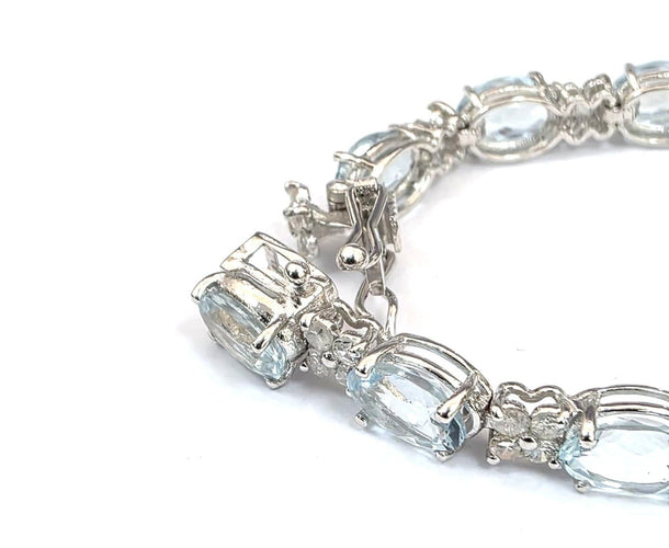 Bracelet Bracelet tennis en or blanc 18 ct avec aigue-marine et diamants 58 Facettes 451/26 D