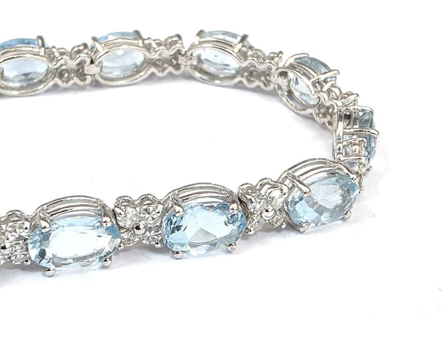 Bracelet Bracelet tennis en or blanc 18 ct avec aigue-marine et diamants 58 Facettes 451/26 D