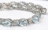 Bracelet Bracelet tennis en or blanc 18 ct avec aigue-marine et diamants 58 Facettes 451/26 D