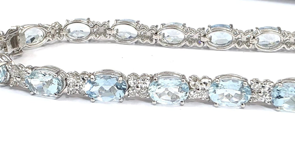 Bracelet Bracelet tennis en or blanc 18 ct avec aigue-marine et diamants 58 Facettes 451/26 D