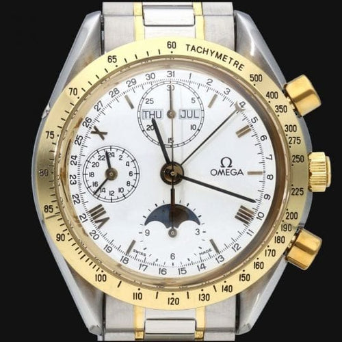 Montre Omega Speedmaster - Montre Day Date automatique en or jaune et acier 58 Facettes MT47403
