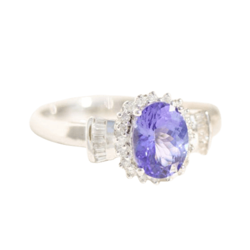 57 Bague entourage en or blanc 18K avec tanzanite et diamants 58 Facettes 3230-3