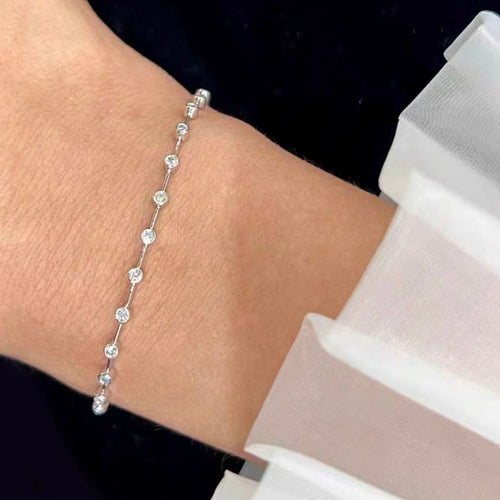55ct-tennis-bracelet-18k-white-gold-embrace-2 (1).jpg