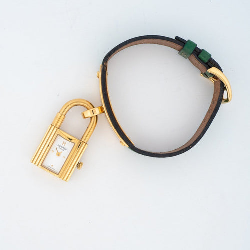 Montre Hermès Kelly - Montre en acier plaqué or, cadran ivoire 58 Facettes 563
