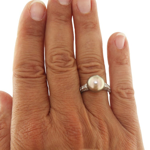 https://www.gioielleriaguidetti.it/wp-content/uploads/2026/07/G3997d-anello-vintage-guidetti-oro-perla-diamanti.jpg