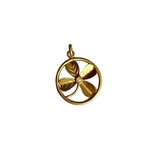 https://cdn.shopify.com/s/files/1/0943/8576/6747/files/pendentif-or-jaune-18-carats-vintage-trefle.jpg?v=1792647798