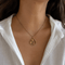 https://cdn.shopify.com/s/files/1/0943/8576/6747/files/trefle-or-perle-pendentif.png?v=1778845791