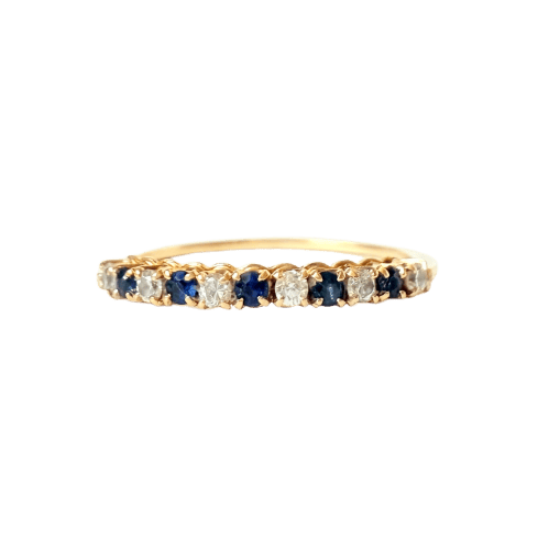 54 Demi-alliance - Bague en or jaune, diamants et saphirs 58 Facettes