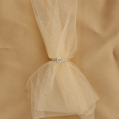 53 Mauboussin - Bague solitaire en or blanc et diamants 58 Facettes