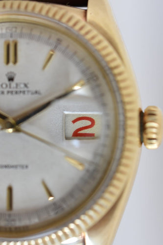 Rolex Oyster Perpetual Date Ovettone - Montre en or jaune 14 carats 58 Facettes RO-800