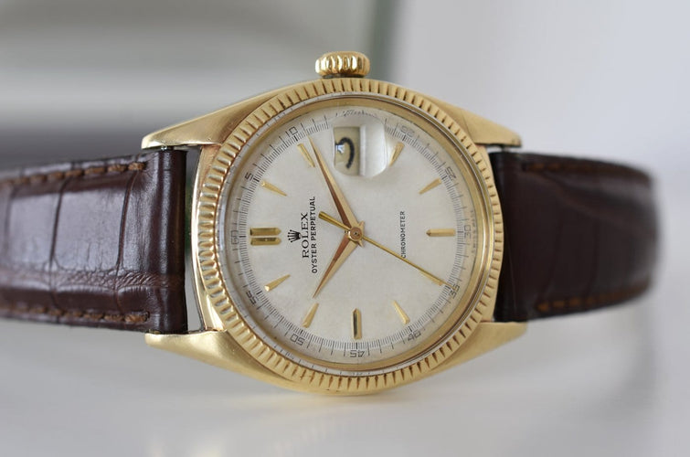 Rolex Oyster Perpetual Date Ovettone - Montre en or jaune 14 carats 58 Facettes RO-800