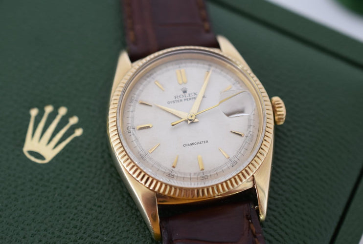 Rolex Oyster Perpetual Date Ovettone - Montre en or jaune 14 carats 58 Facettes RO-800