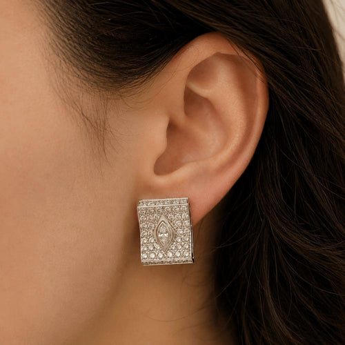 boucles-doreilles-or-gris-18k-diamants-350-cts-vers-2000.jpg