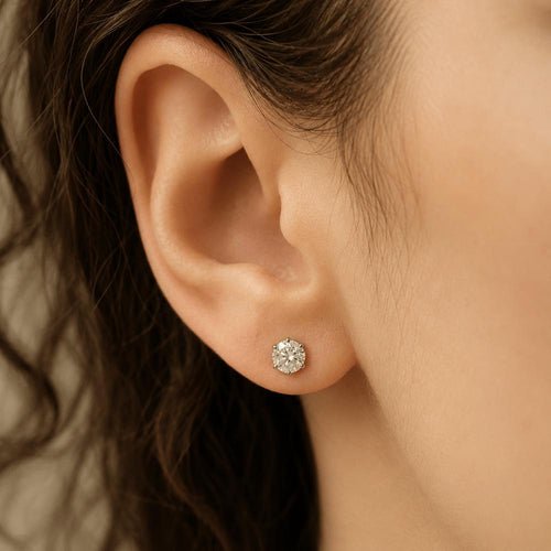 puces-doreilles-or-gris-18k-et-Platina-deux-diamants-054-ct-g-vs-vers-2010.jpg