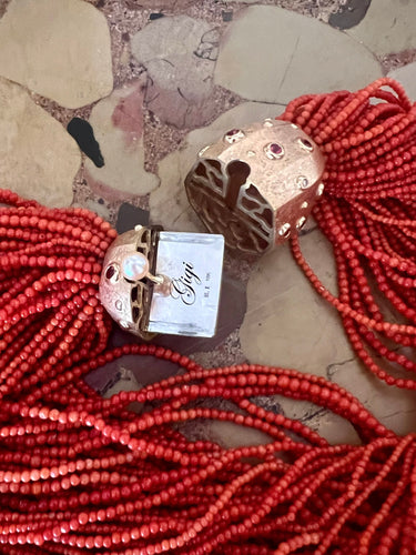 Collier Collier torsadé en or jaune 18 carats et corail 58 Facettes C161