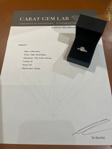 Bague 50 Solitaire - Bague diamant en or gris 18 carats 58 Facettes BD178