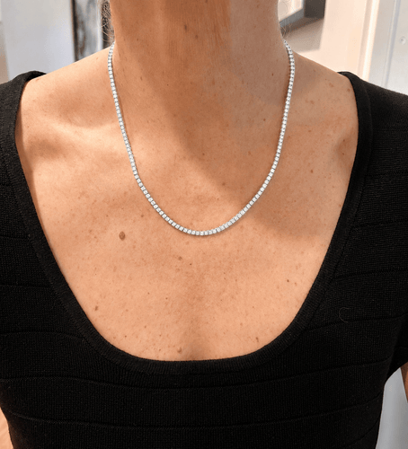 https://cdn.shopify.com/s/files/1/0647/1470/3075/files/Collier_de_Luxe_-_Collier_Riviere_de_Diamants_10.15_Carats_Or_Gris_-_Joaillerie_Paris_-_Les_Pierres_de_Julie_1.png?v=1784903811
