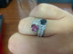 52.5 Toi et Moi - Bague en or blanc avec rubis, saphir et diamants 58 Facettes BA 210