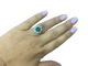 54 Bague cocktail en or blanc 18 carats, émeraude de Zambie et diamants 58 Facettes BA 460