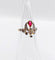 Bague 42 Bague duchesse antique en or rose 18k, pierre rouge et diamants 58 Facettes A07649