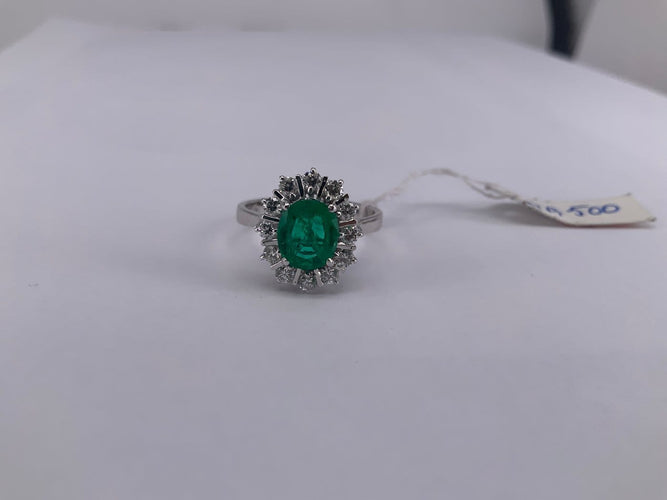 Bague 51.5 Bague halo en or blanc avec émeraude ovale et diamants 58 Facettes BA 500