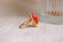 https://cdn.shopify.com/s/files/1/0963/7950/2920/files/Bague-cabochon-Corail-oval-bague-unique_caf2edaa-c73a-4a0c-b39f-867ee07e63ee.jpg?v=1779980728