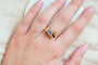 https://cdn.shopify.com/s/files/1/0963/7950/2920/files/Bague-de-fiancailles-en-Or-jaune-18-carats-ornee-d_une-pierre-bleue-ciel_4e4cd369-fa0d-4b06-98fc-76d40cf718a1.jpg?v=1779371117