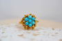 https://cdn.shopify.com/s/files/1/0963/7950/2920/files/bague-fleur-turquoise_fdb926c5-57fc-4adc-bba3-caea5ef2f0e3.jpg?v=1779981926