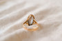https://cdn.shopify.com/s/files/1/0963/7950/2920/files/Bague-Marquise-Vintage-en-Or-jaune-18-carats_ef278610-c943-4cfa-9dbd-f3e8fa6aab20.jpg?v=1779982199