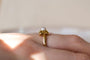 https://cdn.shopify.com/s/files/1/0963/7950/2920/files/Bague-de-fiancailles-Vintage-en-Or-jaune-18-carats-ornee-d_une-Perle_899d4e95-71b5-44de-940c-8ff25a8c858d.jpg?v=1779982110