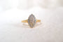 https://cdn.shopify.com/s/files/1/0963/7950/2920/files/bague-navette-2-Ors-diamants_44ee86d5-9604-45cb-bd16-3c9fcc11ff24.jpg?v=1779982648