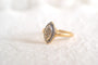 https://cdn.shopify.com/s/files/1/0963/7950/2920/files/bague-navette-diamants_31bb3530-b6af-4838-b7c9-5d96ef628472.jpg?v=1779982648