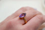 https://cdn.shopify.com/s/files/1/0963/7950/2920/files/bague-navette-amethyste_03a2462e-cc86-4cfb-a8f0-41a30668019a.jpg?v=1779383923