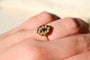 https://cdn.shopify.com/s/files/1/0963/7950/2920/files/bague-saphir-diamant-1_b74e3770-1f21-40a2-b2fb-ee867c725e4e.jpg?v=1779985137