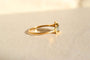 https://cdn.shopify.com/s/files/1/0963/7950/2920/files/bague-rectangulaire-or_0a3abed8-ed15-43bb-b594-dd8f74a8866e.jpg?v=1779385720