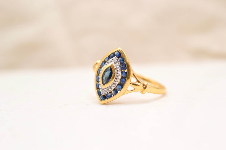 https://cdn.shopify.com/s/files/1/0963/7950/2920/files/bague-navette-or.jpg?v=1782744277