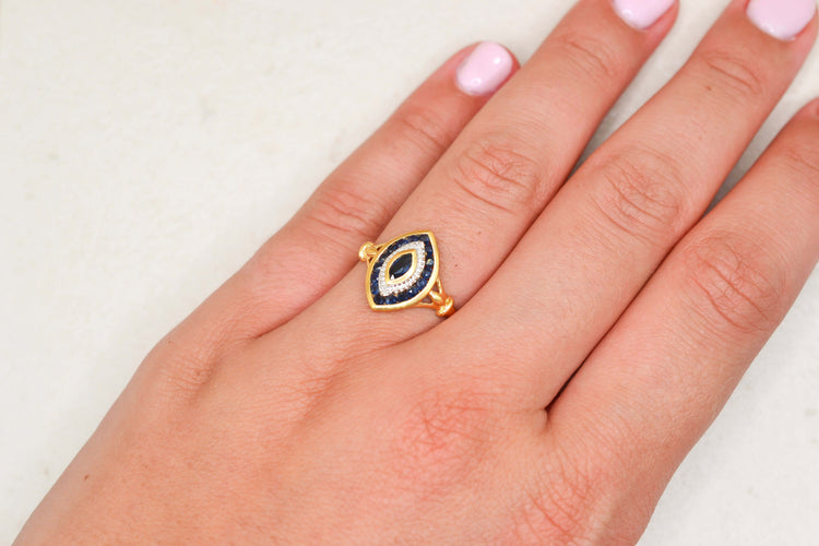 https://cdn.shopify.com/s/files/1/0963/7950/2920/files/bague-vintage-navette-or.jpg?v=1782744278