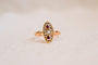 https://cdn.shopify.com/s/files/1/0963/7950/2920/files/Bague-Navette-en-Or-jaune-18-carats-centree-d_une-Perle-entouree-de-pierres-rouges_5fa598dc-2eba-4eeb-9c55-1f8ae23fcff9.jpg?v=1779374039