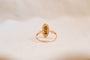 https://cdn.shopify.com/s/files/1/0963/7950/2920/files/Bague-Navette-Vintage-en-Or-jaune-18-carats-ornee-d_une-Perle-et-de-pierres-rouges_0115e23a-8c81-48e1-ab24-d6d0ac548466.jpg?v=1779374043