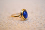 https://cdn.shopify.com/s/files/1/0963/7950/2920/files/bague-ovale-pierre-bleue_d753e043-01d7-467a-992b-329be94627e0.jpg?v=1779981593