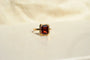 https://cdn.shopify.com/s/files/1/0963/7950/2920/files/bague-grenat-serti-griffes-vintage.webp?v=1783347517