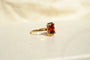 https://cdn.shopify.com/s/files/1/0963/7950/2920/files/bague-grenat-Solitär-vintage.webp?v=1783347517