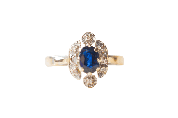 Bague 56 Bague marguerite en or blanc, saphir et diamants 58 Facettes 4146
