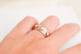 https://cdn.shopify.com/s/files/1/0963/7950/2920/files/bague-vintage-etoile-or-rose-ancienne.jpg?v=1784791649